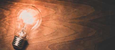 lit light bulb laying down